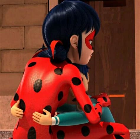 A Cartoon Lady Bug Sitting On Top Of A Woman S Lap In Front Of A Building