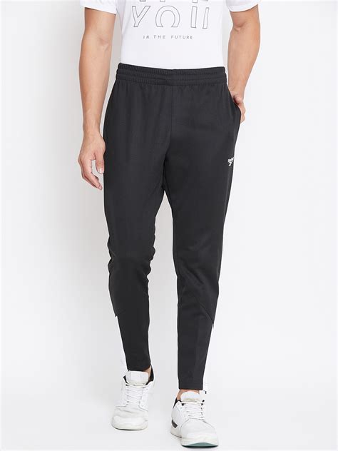 Buy Reebok Classic Men Black Solid Track Pants Track Pants For Men 10575678 Myntra