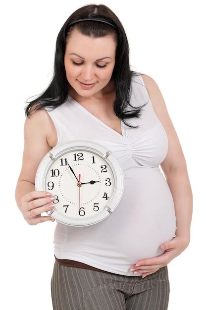 Premium Photo Pregnant Belly With Clock Isolated Over A White