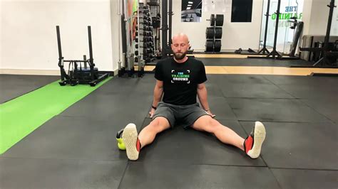 Seated Straddle Hip Flexion End Range Movement W Kettlebell Josh