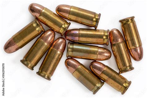 Pile Of 9mm Bullets On A White Background Image Stock Photo Adobe Stock