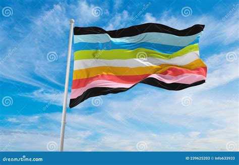 Pride Flag Waving In The Wind At Cloudy Sky Freedom And Love Concept