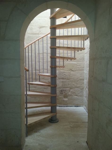 Phoenix Interior Spiral Staircase By Arke Fontanot Wood And Steel Glass Roof Staircase