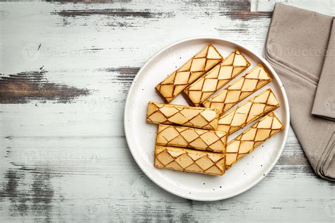 Sfogliatine An Italian Puff Pastry With Glaze On A Plate On White