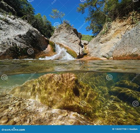 Wild Rocky River Split View Over Underwater Stock Photo Image Of