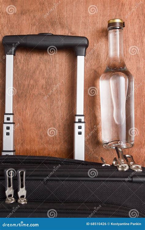 Black Suitcase A Bottle Of Vodka Stock Photo Image Of Closed Shadow