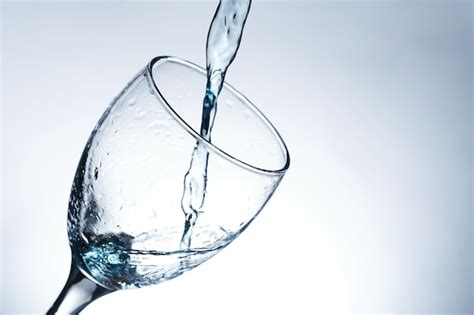 Premium Photo Image Of Pouring Water Into A Glass