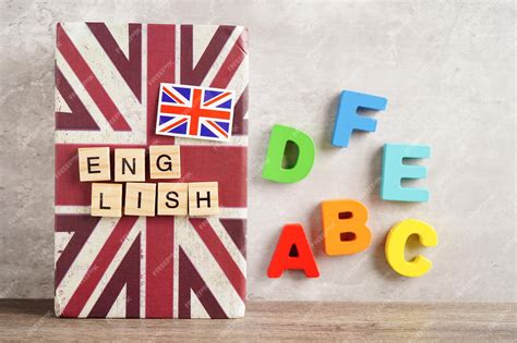 Premium Photo | English book with graduate hat learning and tutorial ...