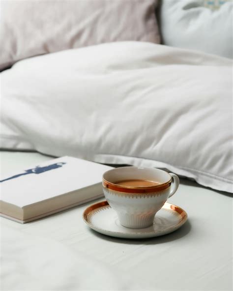 Open Book and a Cup of Coffee · Free Stock Photo