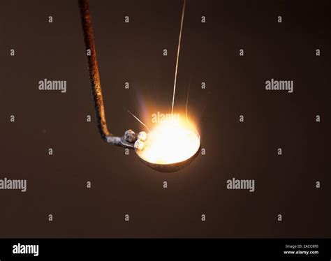 Calcium Flame Test Calcium Burning In Air Producing An Orange Flame