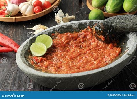 Sambal Tomat or Spicy Tomato Paste on Stone Mortar and Pestle Stock ...