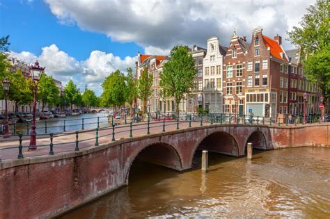 Canal houses of Amsterdam stock photo. Image of architecture - 271976706