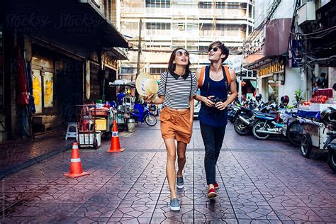 Couple On The Streets Of Bangkok By Stocksy Contributor Lumina