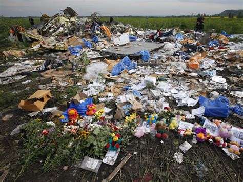 Haunting Photos From Malaysian Airlines Crash Site - Business Insider