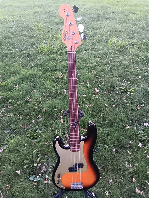 squier left handed precision bass   tobacco burst reverb