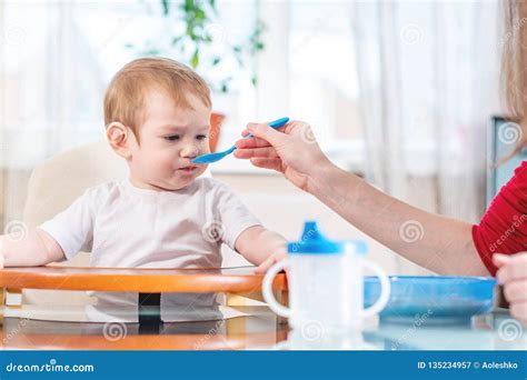 Spoon Feeding Adult Stock Images Download 875 Royalty Free Photos Page 2