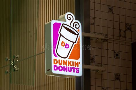 Dunkin Donuts Sign. Dunkin Donuts is a Doughnut Company and Coffeehouse ...