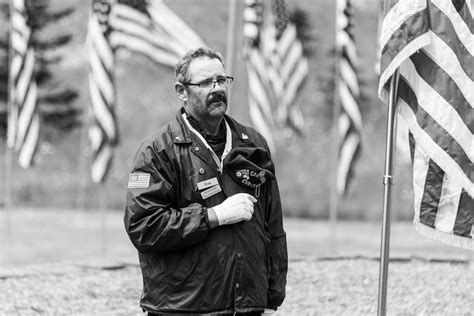 Veteran Showing Respect at Memorial Service · Free Stock Photo