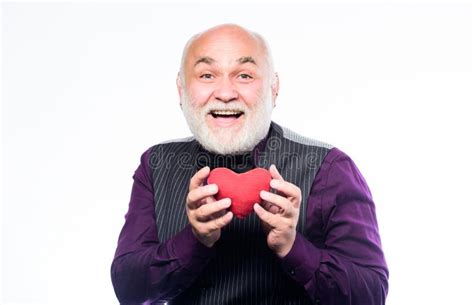 Preventing Heart Attack Senior Bald Head Bearded Man Holding Red Toy