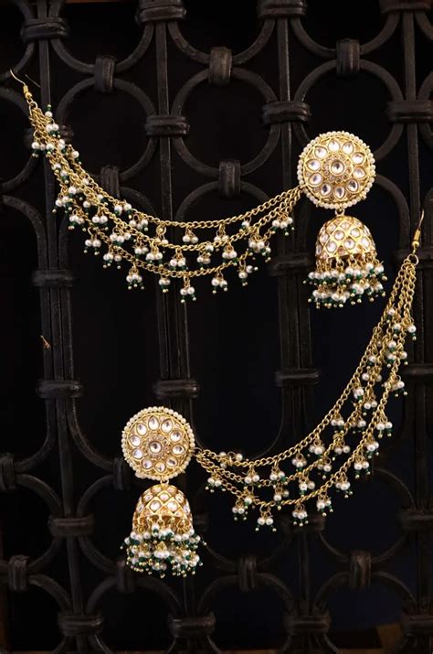 gold plated kundan  pearls jhumka earrings  hair chains gold