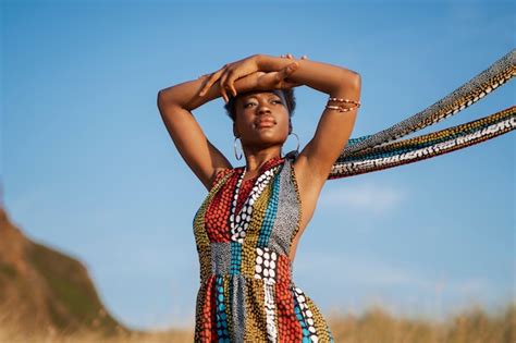 Free Photo | Woman posing in an arid environment while wearing native ...