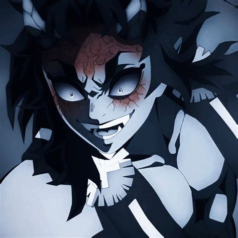 An Animated Image Of A Woman With Black Hair And Red Eyes Wearing A Mask