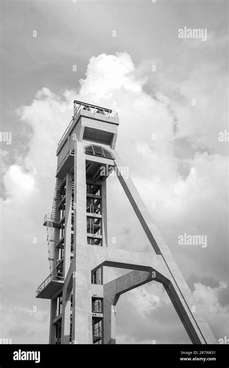 The Tower Of The Former Mine Shaft Against The Blue Sky Currently An