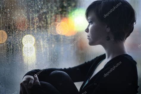 Woman Sad Looking Out Window