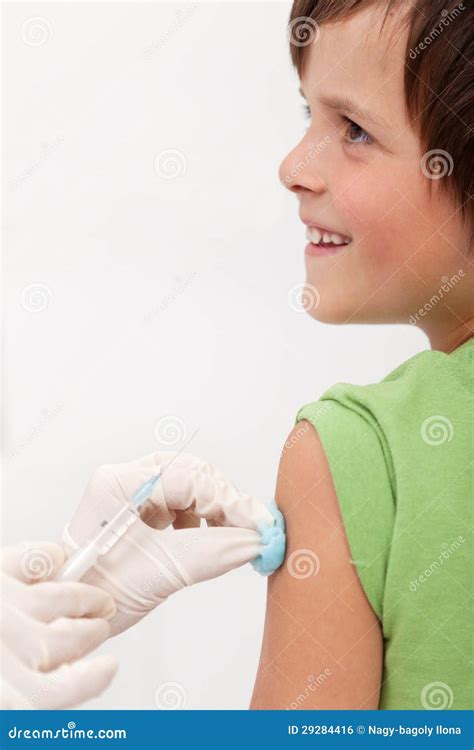 Child Receiving Vaccine With Smile On His Face Stock Photo Image Of