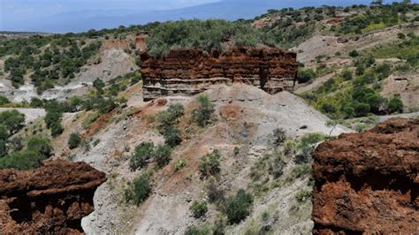 The deposition of different layers (strata) during the formation of the ...