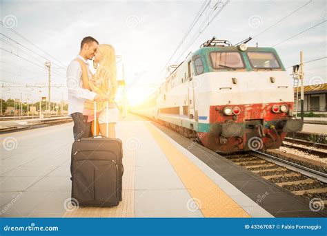 Couple Kissing At Train Station Stock Image Image Of Greeting Glamour 43367087