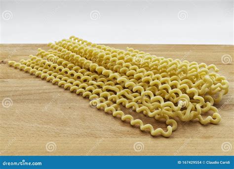 Raw Fusilli Lunghi Bucati Traditional Italian Pasta On Wooden Table