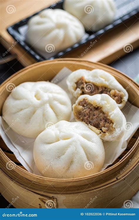 Chinese Steamed Buns On Wood Container Selective Focus Stock Photo