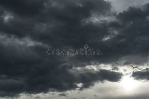 Threatening Dark Clouds Almost Covering The Entire Sky Stock Photo