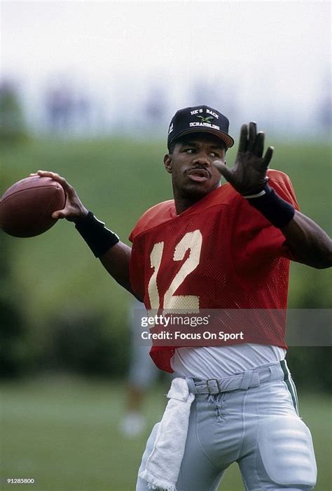 Quarterback Randall Cunningham of the Philadelphia Eagles throws a ...