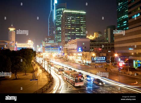 Shanghai at night in downtown Stock Photo - Alamy