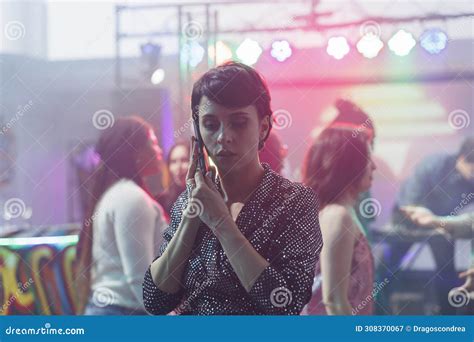 Woman Answering Smartphone Call In Club Stock Image Image Of