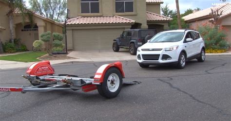 How to Load a Car onto a U-Haul Tow Dolly - Demostration