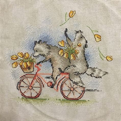 Raccoons On A Bike Cross Stitch Pattern In Cross Stitch Patterns