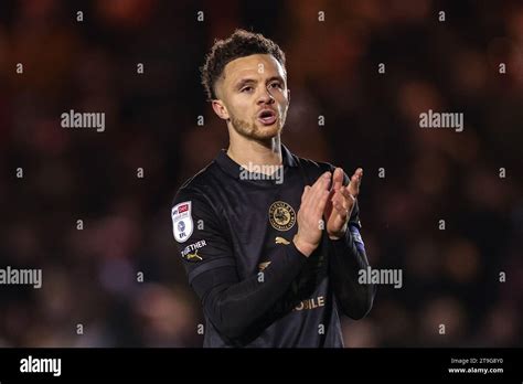 Jordan Williams Of Barnsley Applauds The Travelling Fans During The