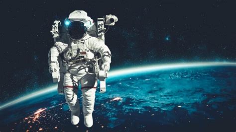 Premium Photo Astronaut Spaceman Do Spacewalk While Working For