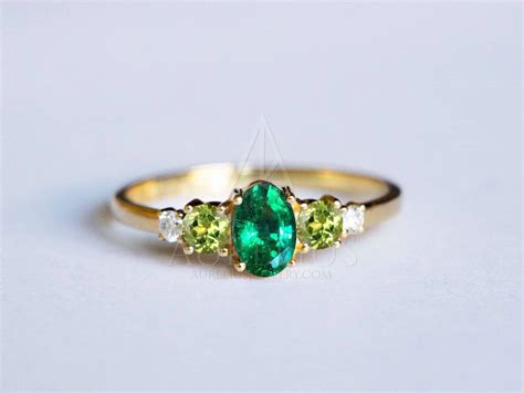 Oval Emerald And Peridot Engagement Ring Aurelius Jewelry