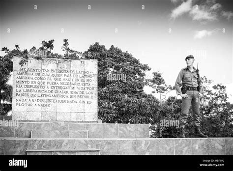 A Cuban soldier stands guard at the memorial and tomb of Che Guevara ...