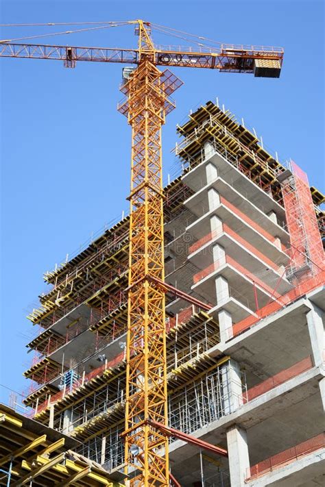 Construction Site Crane And High Rise Building Under Construction