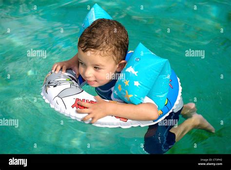 CHILD, SWIMMING POOL Stock Photo - Alamy