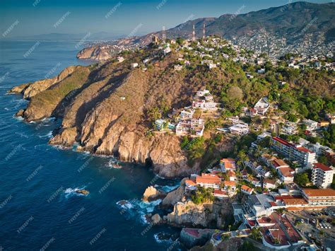 Premium Photo | Aerial of cliffs in acapulco skyline surrounded by the