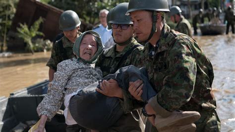 Japan Floods Death Toll Rises To 176 As Abe Visits Affected Areas