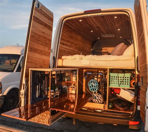 The Back End Of A Van With Its Doors Open And It S Cargo Compartment Opened