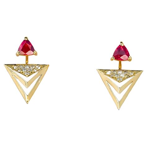 Ruby And Diamond And 14 Karat Gold Stud Earrings With Halo Diamonds