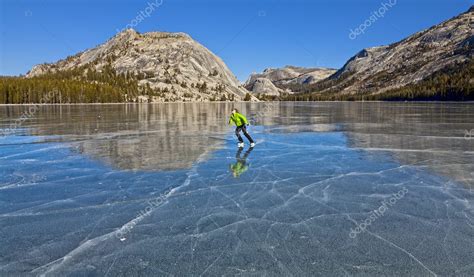 Frozen lake ice skating. — Stock Photo © gregepperson #8273676